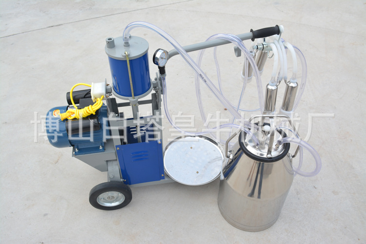 擠奶機