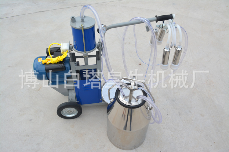 擠奶機